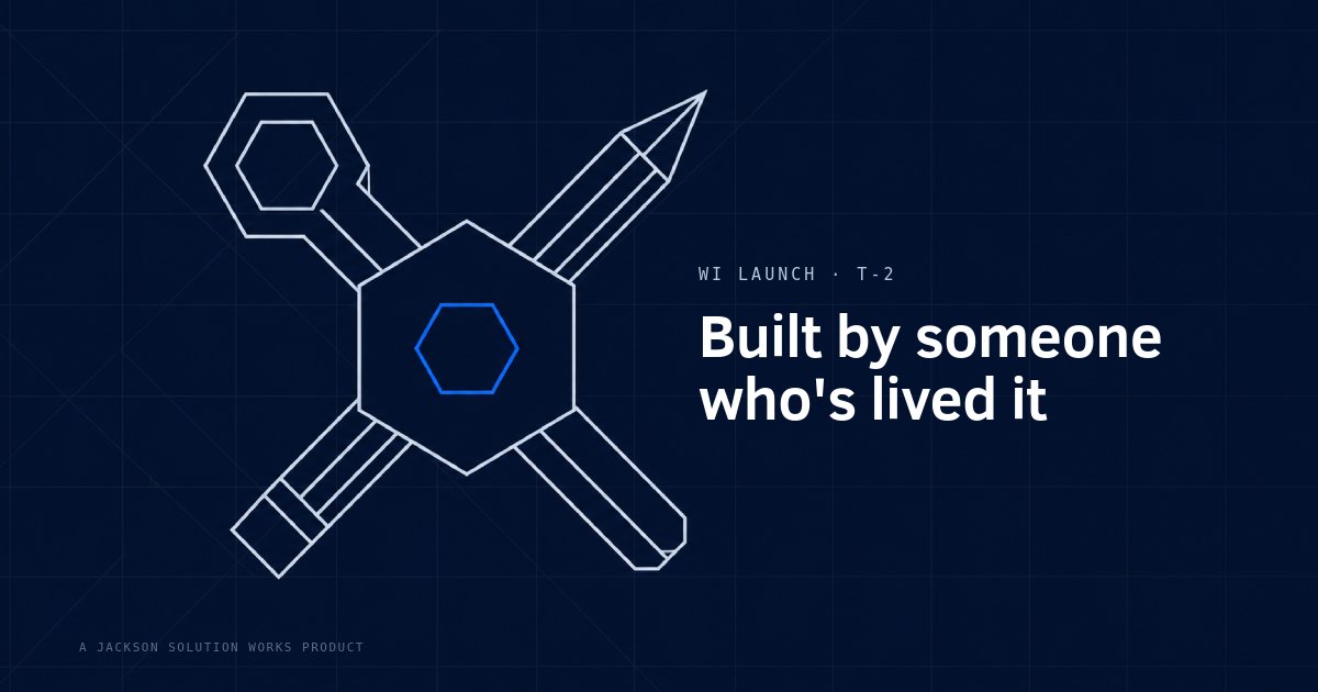 Faceted hard hat over crossed angular tools with a hexagonal wrench head, representing a builder's hands-on background